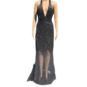 Badgley Mischka black evening gown with small train and embellishments; Bridal